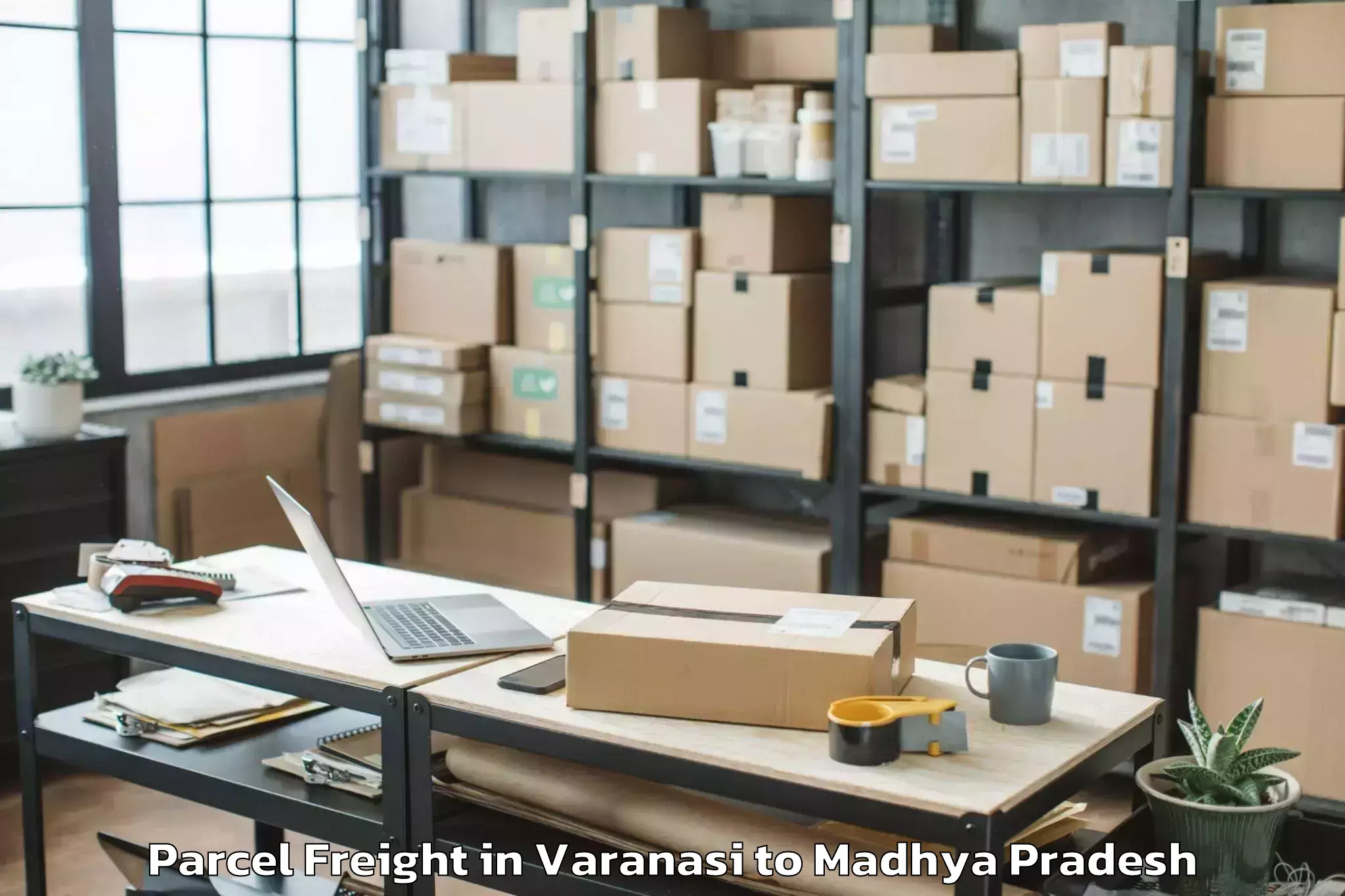 Book Your Varanasi to Mahidpur Parcel Freight Today